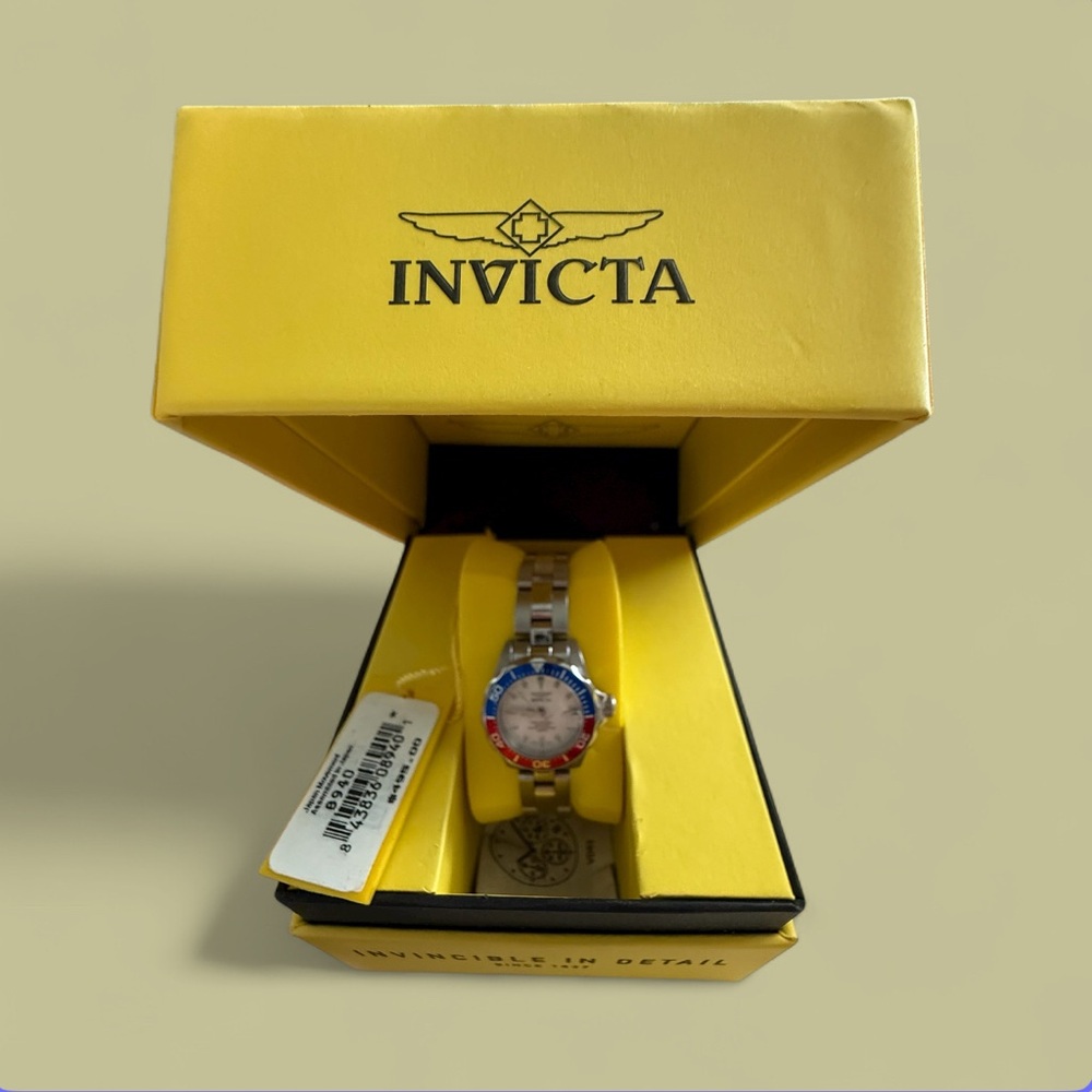 Invicta Silver Watch with Blue and Red Highlights